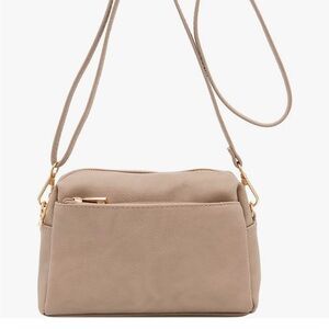 NWT light pink small cross body bag.